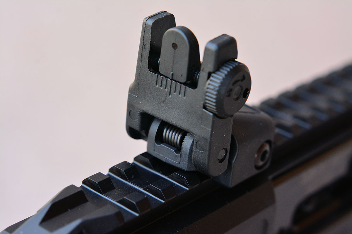 The rear sight is a Ruger Rapid Deploy that folds down and is adjustable for windage.